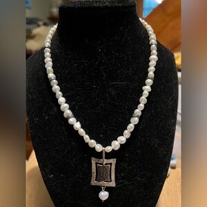 Authentic pearl and sterling 925 silver tested pendant with stations of beads.